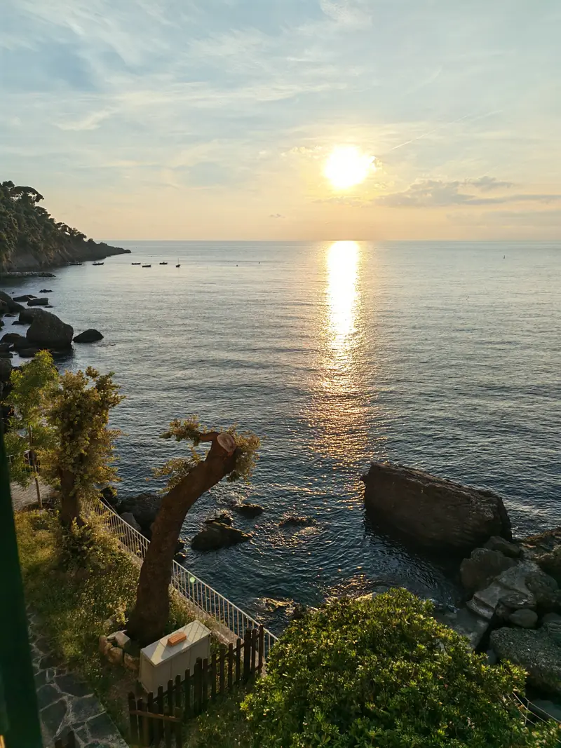 Golden sunset over the sea seen from the terrace