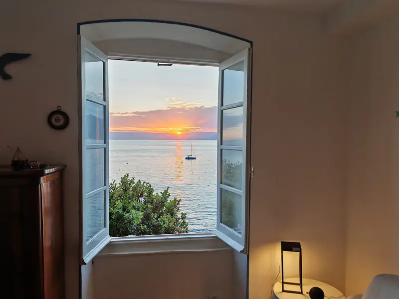 Sunset seen through an open window